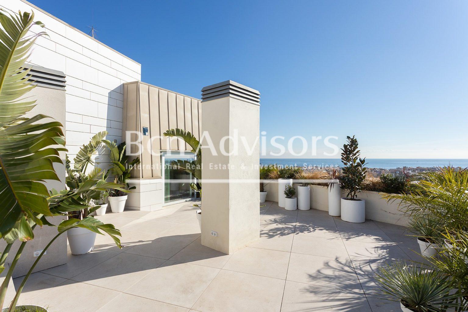 Image showcasing Archways appear throughout a Barcelona penthouse by PMAA - Dezeen